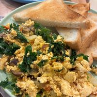 Tofu scramble with toast  at Ivegan Supershop Xuan Thuy - Healthy Plant Based Cafe in Ho Chi Minh City