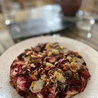 Vegan pizza 🍕 tastes amazing, but is very small. It really tastes amazing though    at Kaani Nilam - Auroville in Viluppuram
