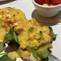 Vegan “eggs Benedict” side of fruit & tempeh “bacon"  at Silver Diner in Arlington