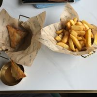 Vegetable (vegan) Samos, comes with mango chutney plus a potion of chips. at Babyccino Coffee & Kitchen  in Tonbridge