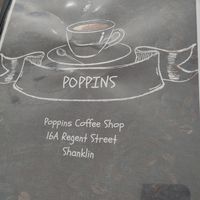 Menu cover with note about no bacon served. at Poppins in Shanklin