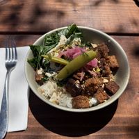 Tempeh Bowl with pickles and pepita saucee  at Saanu Café & Sauna in Joseph
