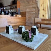 Onigiri. Pickled plum and tempeh/shiitake are vegan.   at Saanu Café & Sauna in Joseph