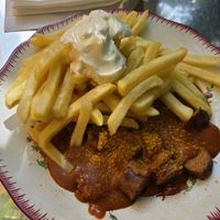 Currywurst and fries at Oder Wat Imbiss in Zurich