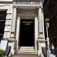 Entrance alongside outside seatingg  at The Anchor Line in Glasgow