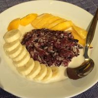 Black Sticky Coconut Rice Dessert with Mango and Banana -- YUM!!! A must try in Thailand!!! ^_^ at May Kaidee Chiang Mai in Chiang Mai