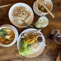 “Fish” Curry, Penang Curry, Pumpkin Hummus, Butterfly Pea Drink, Green Tea with coconut milk   at May Kaidee Chiang Mai in Chiang Mai