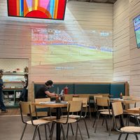 Large projection wall in the back that features events like the World Cup.  at Hi-Lo Taco Co. in Philadelphia