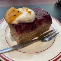 Cherry cake $11- candied orange and meringue on top was lovely but the rest of the cake is dry and gluey 😕 This is the only dessert that has disappointed me.  at Smith & Deli CBD in Melbourne