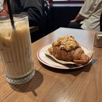 Almond croissant and iced chai latte with oat milk  at Smith & Deli CBD in Melbourne