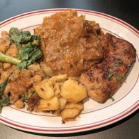 Grilled Peri Peri Chicken; Lamb & rosemary stew; Braised chickpeas  and Grilled & herb potatoes at Smith & Deli CBD in Melbourne
