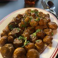 PX mushrooms $18- beautiful button mushrooms braised with Pedro Ximénez sherry. Very tasty with an addictive texture.  at Smith & Deli CBD in Melbourne