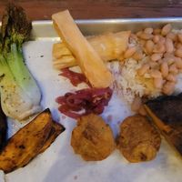 Half of the Vegan Plate. Seared baby bok choy, yucca fries, rice and beans, jerk sweet potato, tostones, and smoked calabaza. at Johnny Lime in St John