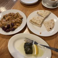 Yigantes and a single stuffed grape leaf   at Gardens of Salonica in Minneapolis