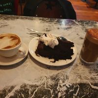 Oat cap, oat dirty chai and a too die for delicious vegan chocolate cake! at Midnight Espresso in Wellington