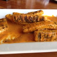 Red Thai Curry vegan wings (partially eaten) at Picazzo's Healthy Italian Kitchen in Scottsdale