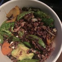 half eaten forbidden rice bowl add avocado SO FLAVORFUL YUM!! at Flower Child - 44th in Phoenix