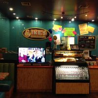 bottled water & a TV (That's Ike on the tele) at Ike's in Mesa