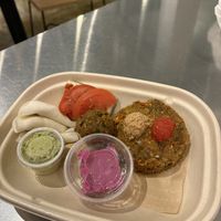 Sampler plate- burger, pizza, meatball, ravioli, basil pesto, and pitaya dessert   at Chicago Raw - Huron St in Chicago
