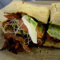 SHIITAKE TERIYAKI “CHICKEN”. Blend of shiitake mushrooms with fresh ginger, organic tamari, green peppers, lettuce, tomato, alfalfa sprouts.

Served on organic kamut ciabatta.

It's pretty tasty! at Copper Branch - Atwater in Montreal