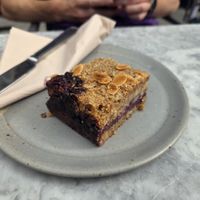 Vegan dark chocolate and raspberry oat slice at Little Loaf Redland in Bristol
