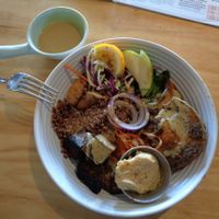 "nourish bowl", always lovely, with kinoa, roasted pumpkin, humus, salads, grains and a great dressing at Two Birds Eatery in Hamilton