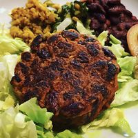 Mexican Burger, Hummus, cauliflower with curcuma, zucchini with corn, kidney beans at Vegan Art in Naples