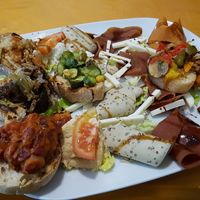 Cheese and faux-meat platter at Vegan Art in Naples