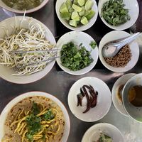 Khao Soi and all the free toppings  at Tamachat in Chiang Rai