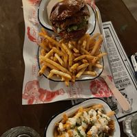 top to bottom: SoCol burger, fries, penthouse fries  at The Waiting Room in South East London