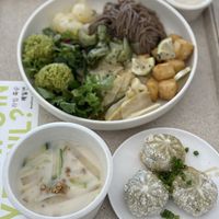 Summer special buckwheat noodle with separate sauce & side dishes. Kongmul (cold soy bean water) is a bit sweet. Buchu mandu (chive dumpling) with soy sauce were good.  at epikore - 에피코어 in Seoul