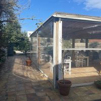 Outdoor garden and mid season tent  at Hibiscus in Braga