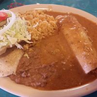 Vegan Lunch Special. 1 tofu puffy taco. 1 tofu enchilada. 2 sides. Brown rice and pinto beans. $6.45 iced tea or coffee included. at La Fiesta Patio Cafe in Universal City