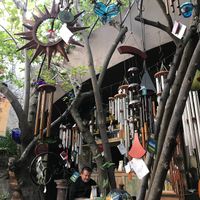 Lots of wind chimes on this shady outdoor patio at Néctar en Camino Silvestre in San Miguel De Allende