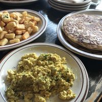 Fries, scrambled tofu and pancakes at The Wayward Cafe in Seattle