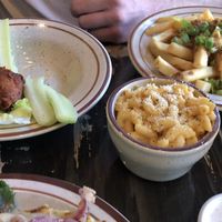 Buffalo wings, that came with vegan blue cheese... so good!!! Mac n cheese & “bacon” cheese fries.  at The Wayward Cafe in Seattle