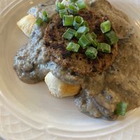 Biscuits with mushroom and sausage gravy with an impossible patty   at MJ's Cafe in Baton Rouge