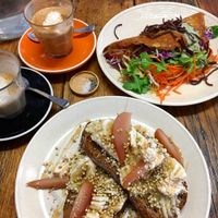 Chickpea omelette and banana, poached pears and soy ricotta on toast.  at Straight Up in Hobart