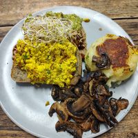 Scrambled tofu with mushrooms and grilled hash (the hash is the big mash ball that has been grilled) at Straight Up in Hobart