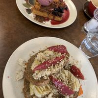 Orange and vanilla waffle with berry ice cream, and banana smash with tea poached pear and soy ricotta  at Straight Up in Hobart