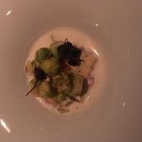 Brussels sprouts, corn and grapefruit in cream at TIAN Munich in Munich