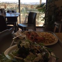 Check out the view! We had a huge salad, pizza, and spaghetti. at Angel Village Cafe in Kanab