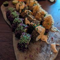 Flambe salmon, cheesy tuna and crispy chipotle. INSANE! at Vegan Sushi Bar in Utrecht