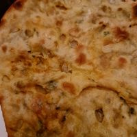 Onion kulcha at Krishna Pait Pooja in Footscray