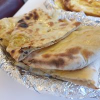 Masala kulcha $5.00: fluffy naan, tasty filling at Krishna Pait Pooja in Footscray