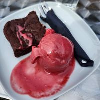 Raspberry ice cream and vegan brownie at Molten Gallery and Cafe in North Shields