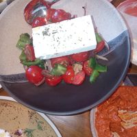 Tomato salad with feta at Kitty Hawk Rooftop Bar and Restaurant in London