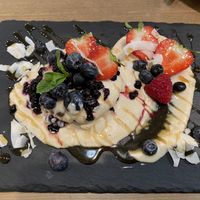 pancakes w/ cashew cream & berries at MyRaw Cafe in Prague