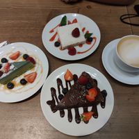 Raffaello, chocolate and green cake. at MyRaw Cafe in Prague