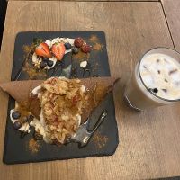 Apple Crêpe with oat milk iced latte   at MyRaw Cafe in Prague